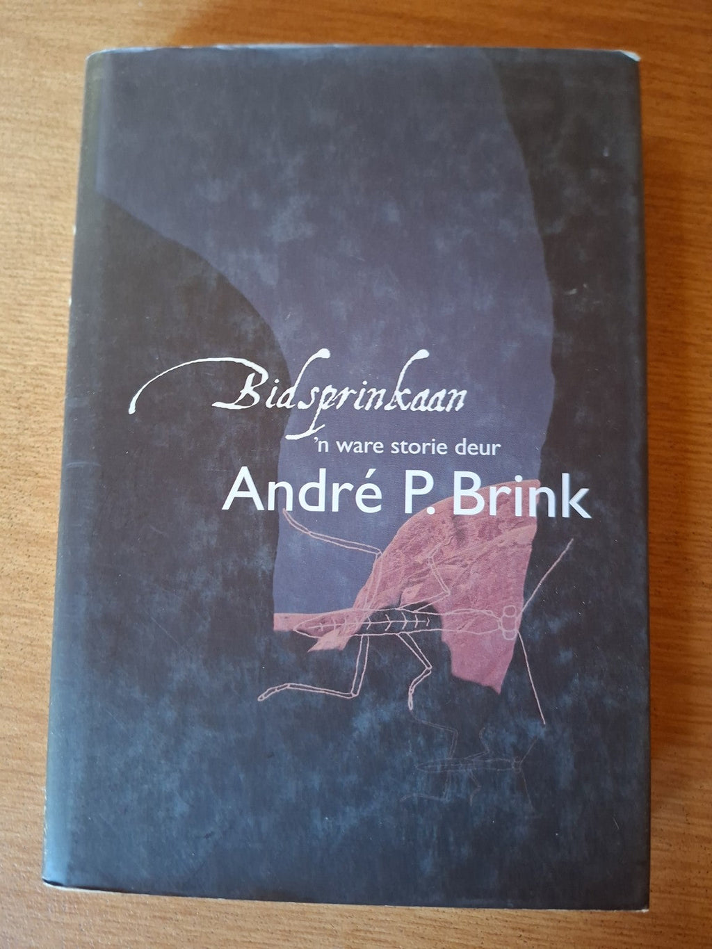 📘 Bidsprinkaan – André P. Brink (Gesigneerde Kopie) (Second-Hand)