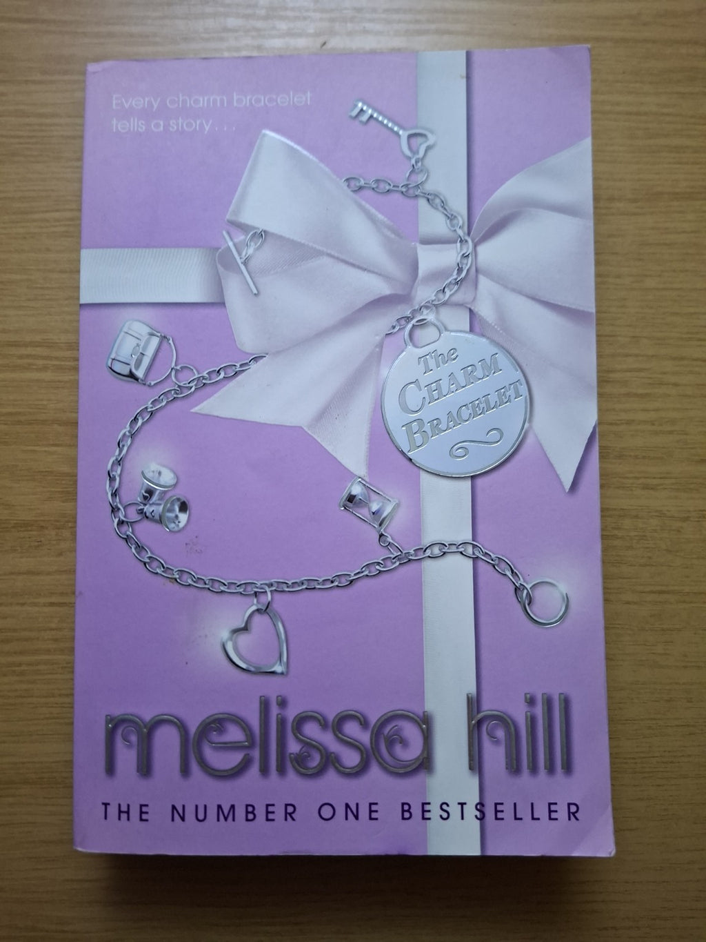 The Charm Bracelet – Melissa Hill (Second Hand Book)