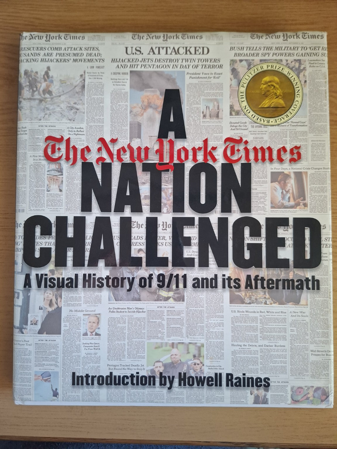 A Nation Challenged: A Visual History of 9/11 and Its Aftermath (Second Hand Book)